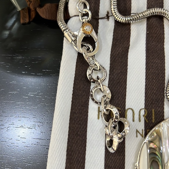 HENRI BENDEL NWOT SILVER TONE DECORATIVE LONG NECKLACE - Picture 4 of 10